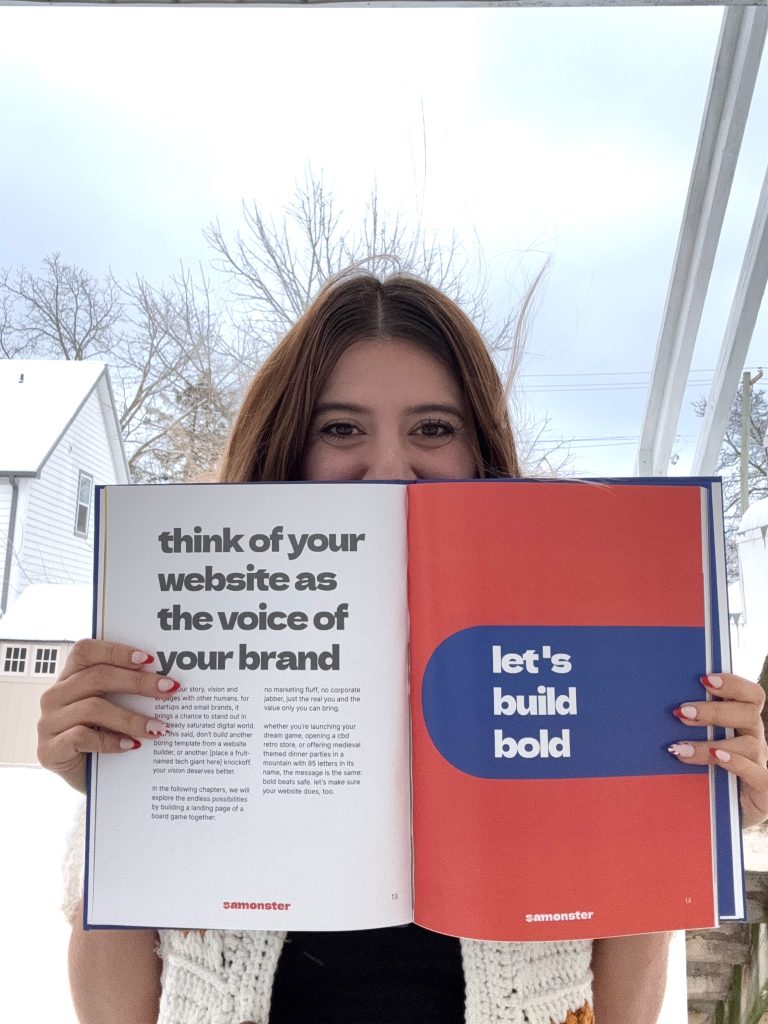build-bold-websites-content picture of a woman holding an open book with the content reading: let's build bold
